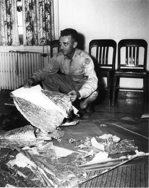 Major Jesse Marcel Sr. Holding Fragments of Crashed UFO Disk